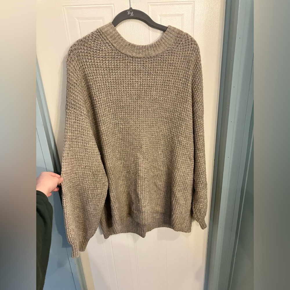 Tan knitted sweater with cuffed sleeves